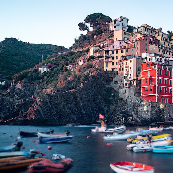 white-and-red-boat-on-water-near-brown-concrete-buildings-3711348.jpg